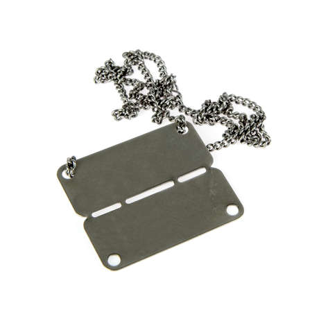 a military necklace with a metal sign with informationの写真素材