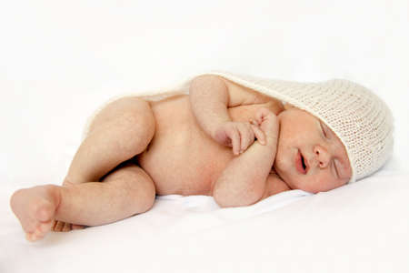 a sweet baby sleeping on a blanketの写真素材