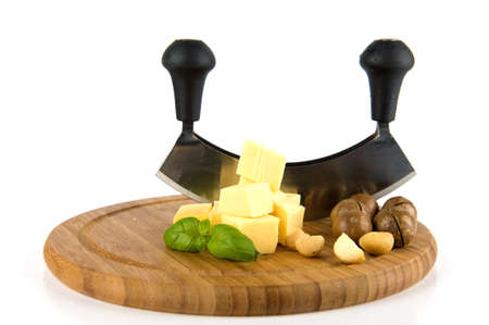 cheese, nuts and a cheese slicerの写真素材