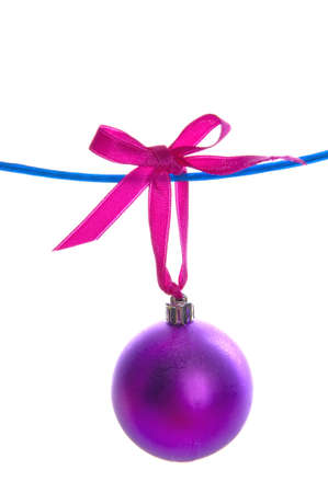 a purple christmas ball on a white backgroundの写真素材