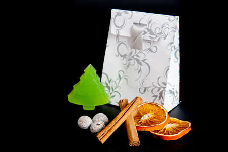 a paperbag for christmas with a soap tree and spicesの写真素材