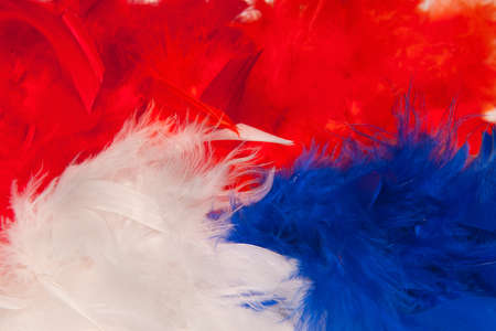 fan stuff for the europian football championship in the colors of the dutch flag, red,white and blueの写真素材