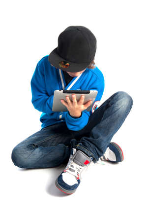 a teenage boy with a tabletの写真素材