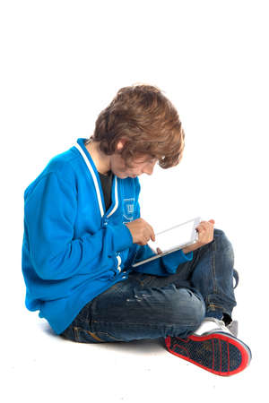 a teenage boy with a tabletの写真素材
