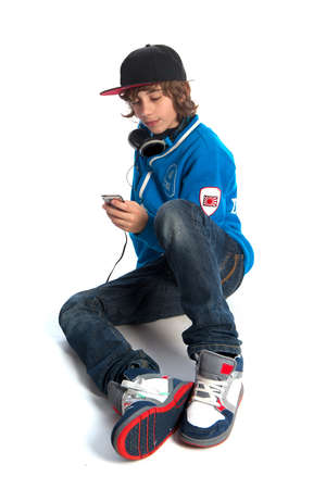 a teenage boy with an mp3-playerの写真素材