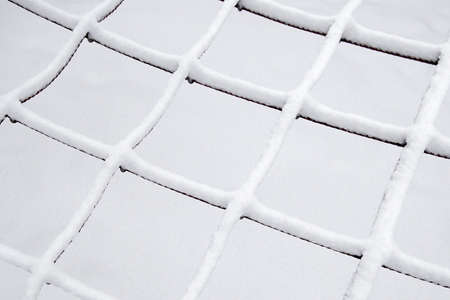 a background made of a rack with snowの写真素材