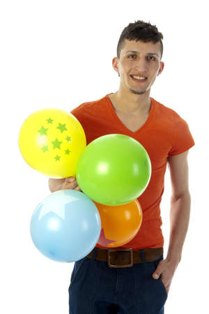a happy birthday boy with a lot of colorful balloonsの写真素材