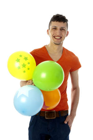 a happy birthday boy with a lot of colorful balloonsの写真素材