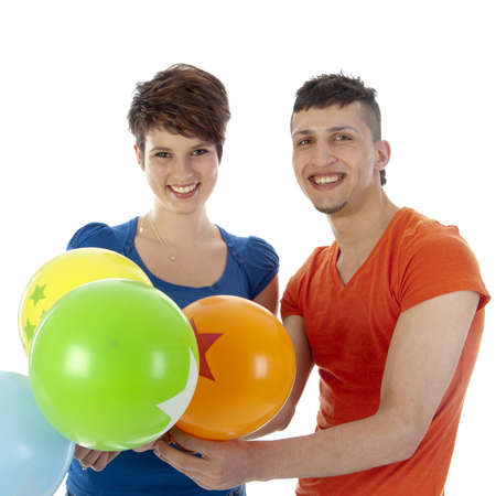 happy couple with colorful balloons on a white backgroundの写真素材