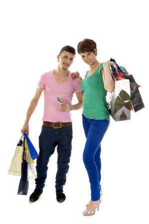 a couple with shopping bags on a white backgroundの写真素材