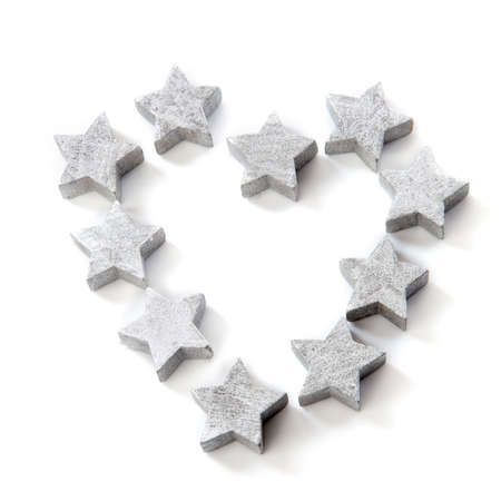silver stars for christmas in the shape of a heartの写真素材