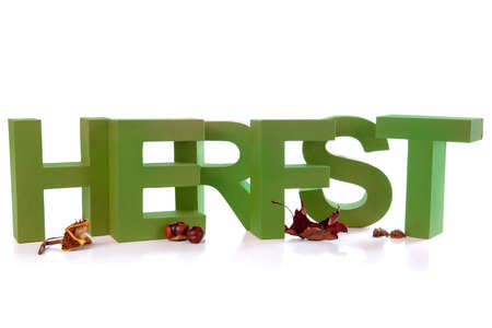 Letters make the dutch word Fall, with a lot of Autumn productsの写真素材