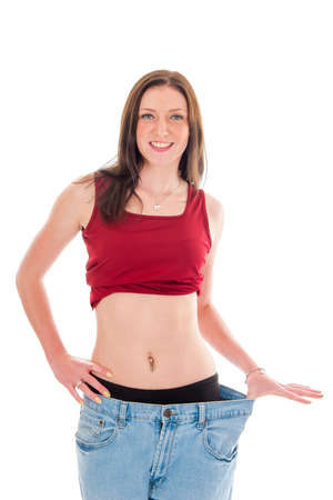 a girl, celebrating her success of loosing weightの写真素材