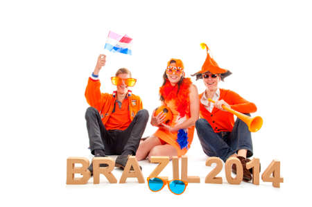 two boys and a girl, the supporters of the dutch soccerteam のeditorial素材