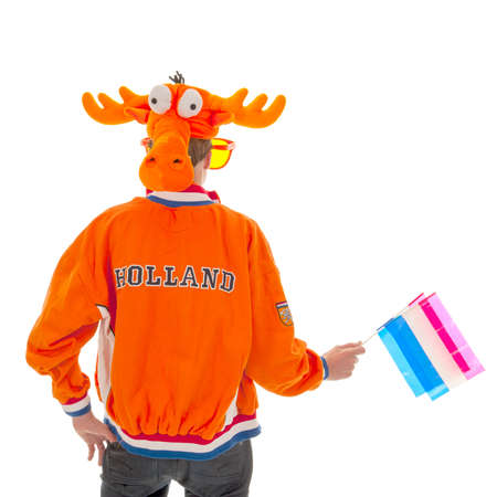 a boy ready to support the dutch soccer teamの写真素材