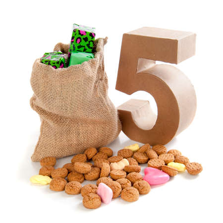 A jute bag with gingernuts, for celebrating the dutch holiday " sinterklaas " on the fifth of Decemberの写真素材