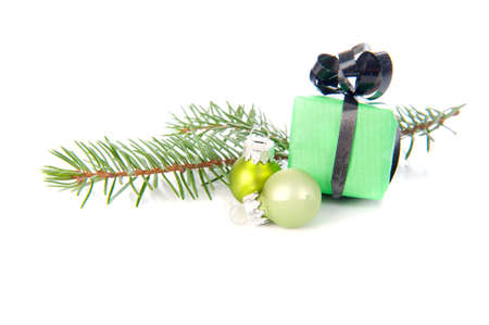 Christmas presents in green on a white backgroundの写真素材