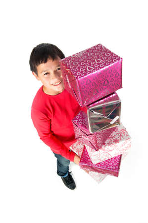 a boy, with a lot of presents on a white backgroundの写真素材