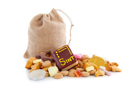 A jute bag full of pepernoten, for celebrating a dutch holiday " Sinterklaas "  on the fifth of Decemberの写真素材