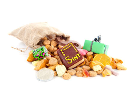 A jute bag full of pepernoten, for celebrating a dutch holiday " Sinterklaas "  on the fifth of Decemberの写真素材