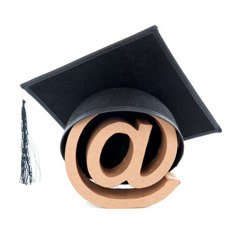 Graduate as computer specialist, on a white backgroundの写真素材