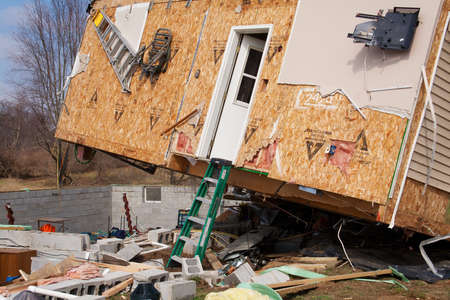 LAPEER COUNTY, MI - MARCH 16  A home heavily damaged by an F2 tornado that swept through Oregon Twp in Lapeer County, MI on March 15, 2012  The house was lifted from its foundation のeditorial素材