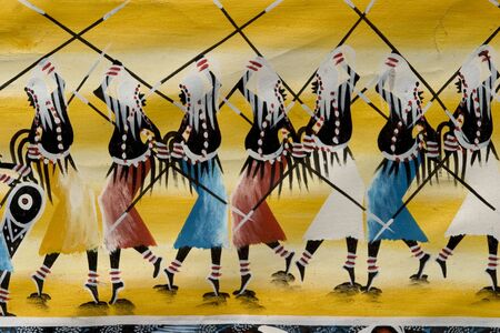 original african paintings in a souvenirs shop at zanzibar islandの写真素材