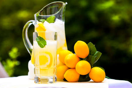 A table full with lemons and lemonadeの写真素材