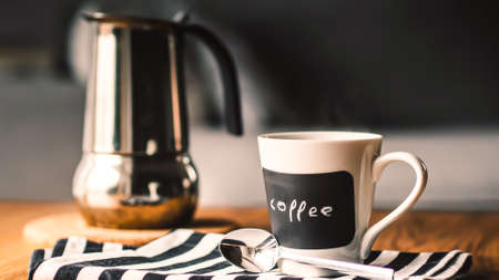 A hot warm coffee cup in the morningの写真素材