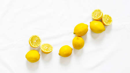 A bunch of lemons on white backgroundの写真素材