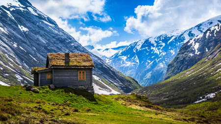 A small wodden house in the mountainsの写真素材