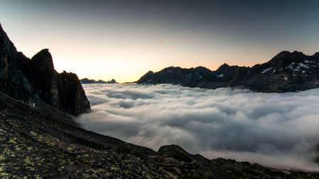 Cloud river in mountainsの写真素材