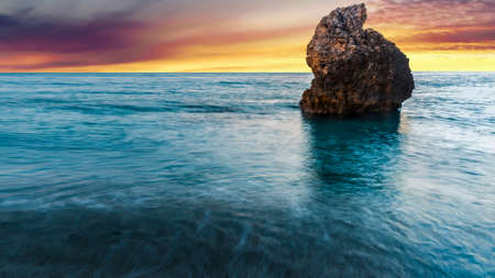 A rock in the oceanの写真素材