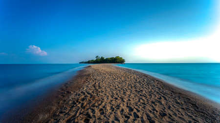 Sand road to an islandの写真素材