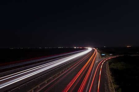 Light trails on the highway backgroundの写真素材