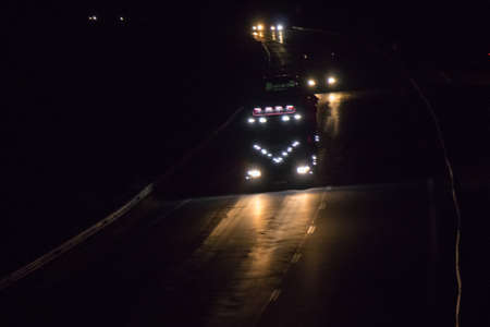 Truck in the dark on roadの写真素材