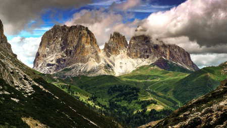 Tall mountains in the clouds landscapeの写真素材