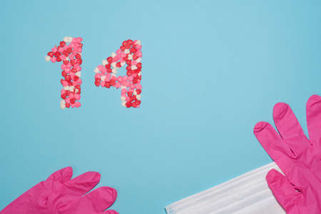 Hearts for February 14, Valentine's Day, with mask and pink gloves, biosecurity protection.の写真素材
