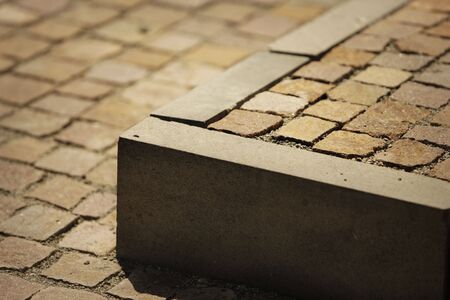 detail of pavement stairs made out of bricks in front of a buildingの写真素材