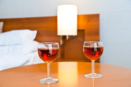 Two glass wine in a room to drink and have fun.の写真素材
