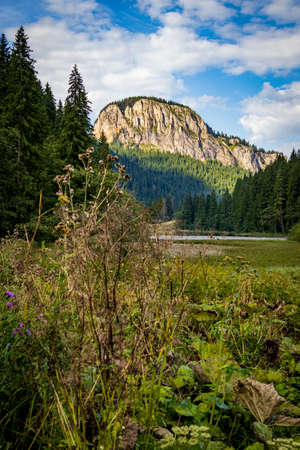 Red Lake (also known as Lake GhilcoÅ) is a natural dam lake in Harghita County, Romaniaの写真素材