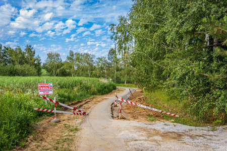 Bicycle road construction site at Lake Gebart in Zalaegerszeg, Hungary. Text on the sign: "Construction Area Authorized Personnel Only"の写真素材