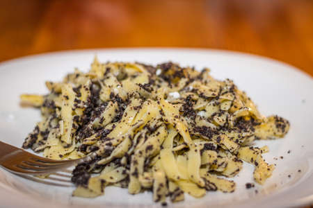Hungarian traditional meal pasta with poppy seeds and sugarの写真素材