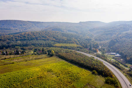 Drone photo of the main road leading out of the city of Zalaegerszeg to the West on a foggy autumn morning, Hungaryの写真素材