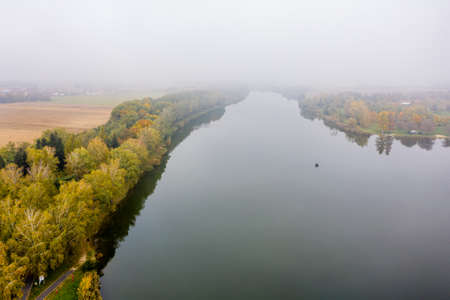 Drone photo of Lake Gebart on a foggy autumn morning in City Zalaegerszeg, Hungaryの写真素材