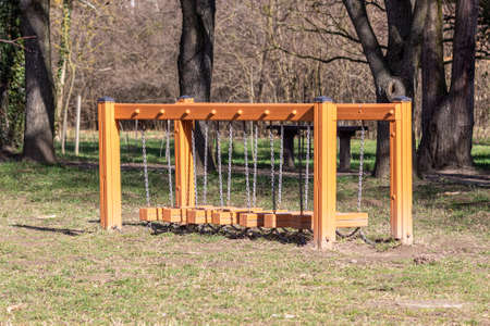 A balancing skill equipment on a playground in a parkの写真素材