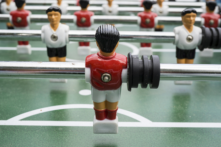 Table football kicker with miniature playersの写真素材