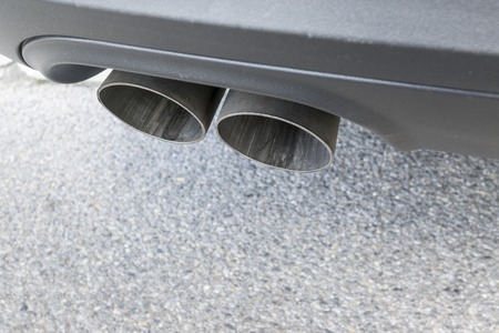 Closeup of a car exhaust. Double pipe from a diesel engineの写真素材