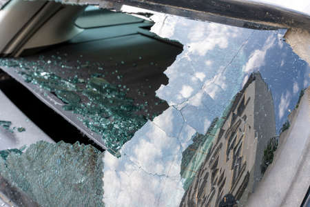Car crash, broken rear window of a car.