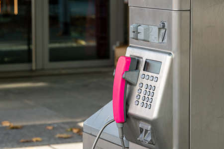 Closeup of public coin operated tel